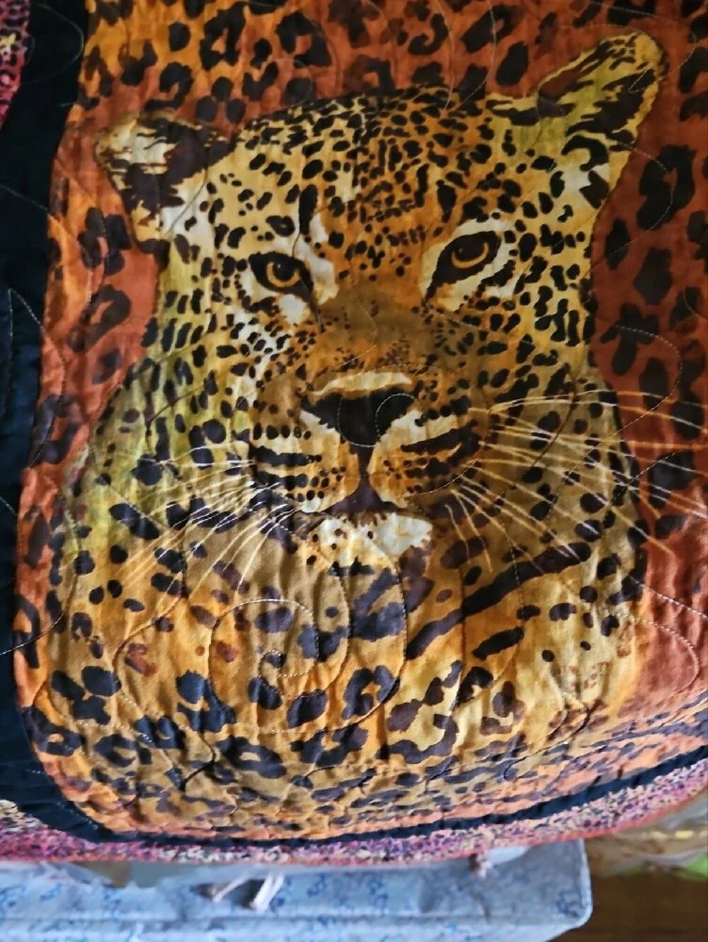Wildlife Print Quilted Throw Blanket in Orange and Brown